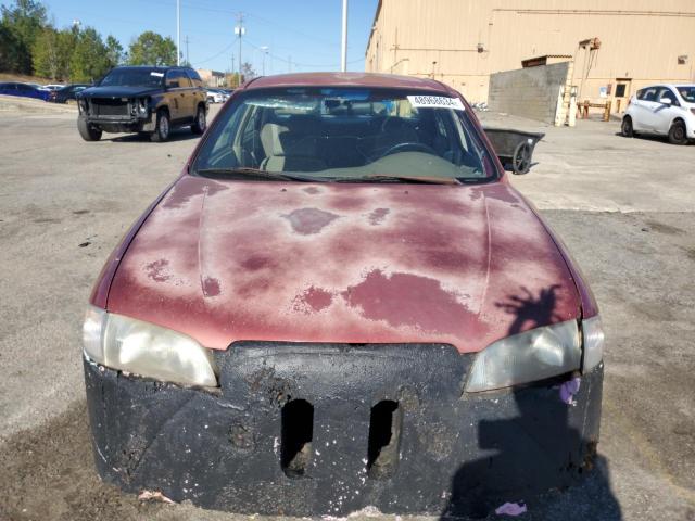 Photo 5 from auction – 1998 MAZDA 626 DX with VIN 1YVGF22C0W5697501