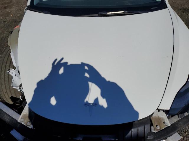 Photo 11 from auction – 2021 TESLA MODEL 3 with VIN 5YJ3E1EA7MF088879