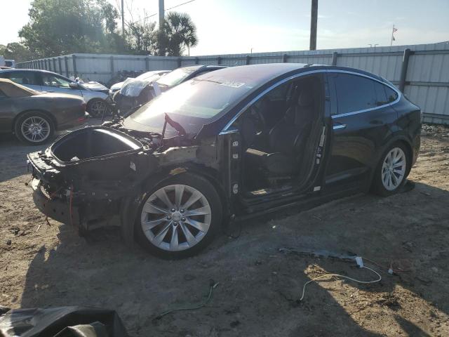 TESLA MODEL X 2018 with VIN 5YJXCDE29JF128652 - Photo from auction