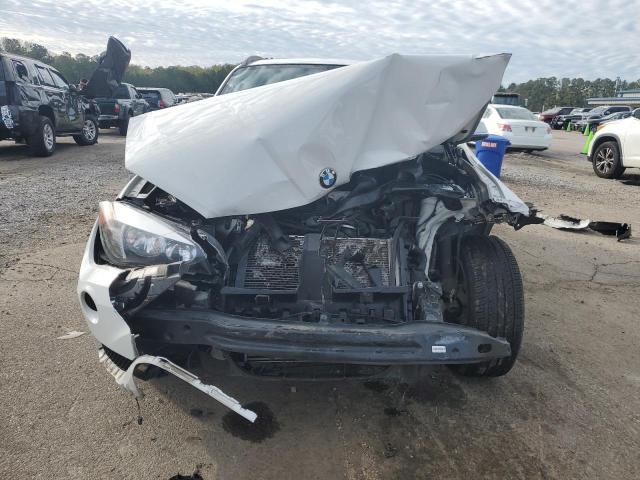 Photo 5 from auction – 2015 BMW X1 SDRIVE2 with VIN WBAVM1C58FVZ94073