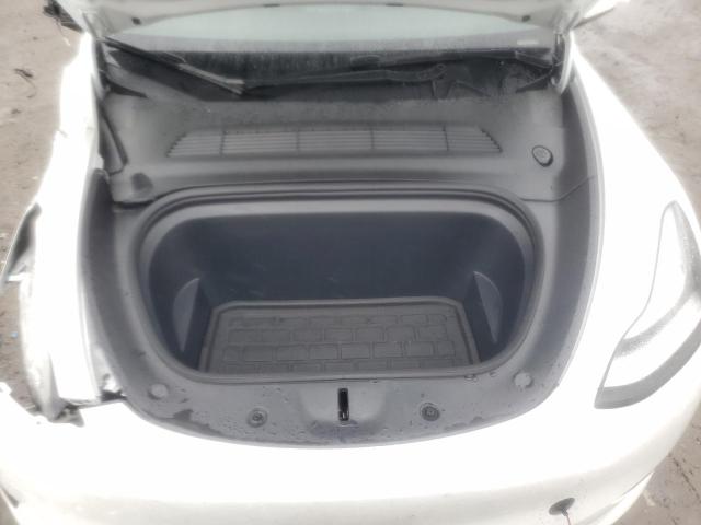 Photo 11 from auction – 2022 TESLA MODEL Y with VIN 7SAYGAEE1NF431788