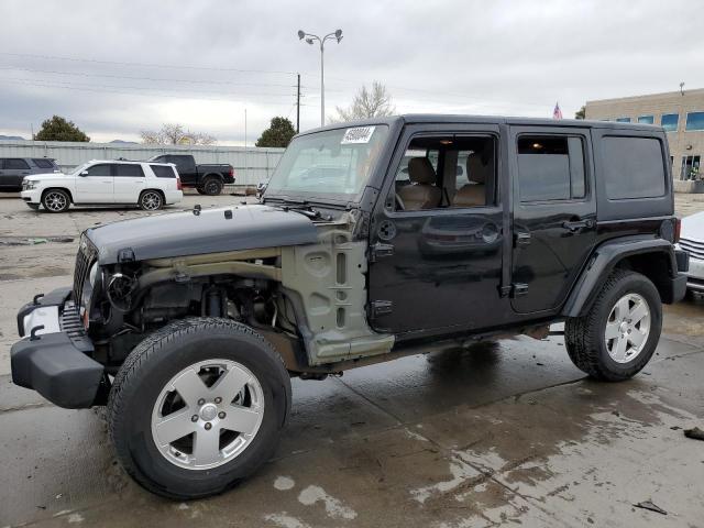 JEEP WRANGLER U 2011 with VIN 1J4BA5H16BL501034 - Photo from auction