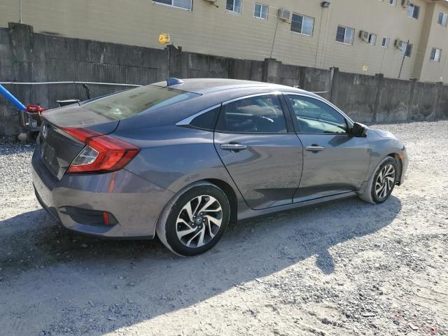 Photo 3 from auction – 2018 HONDA CIVIC EX with VIN 2HGFC2F72JH580920