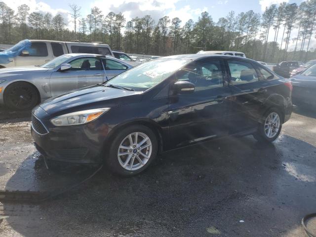 FORD FOCUS SE 2017 with VIN 1FADP3F24HL269416 - Photo from auction