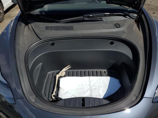 Photo 11 from auction – 2022 TESLA MODEL 3 with VIN 5YJ3E1EC7NF228089