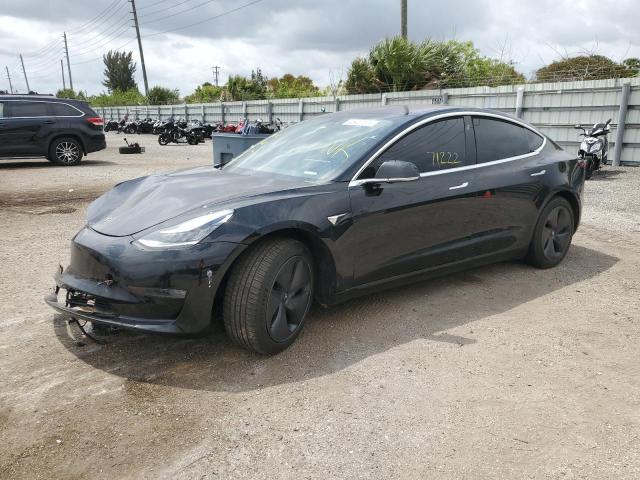 TESLA MODEL 3 2018 with VIN 5YJ3E1EAXJF025402 - Photo from auction