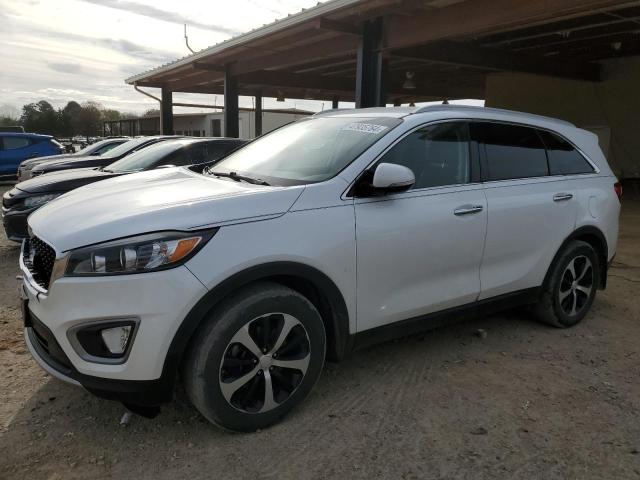 KIA SORENTO EX 2016 with VIN 5XYPH4A13GG029857 - Photo from auction