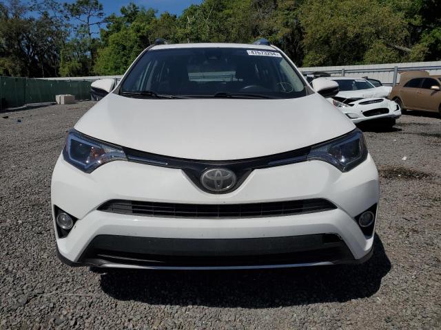 Photo 5 from auction – 2017 TOYOTA RAV4 XLE with VIN JTMWFREV7HD095551