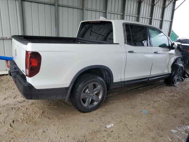 Photo 3 from auction – 2022 HONDA RIDGELINE with VIN 5FPYK3F79NB034568