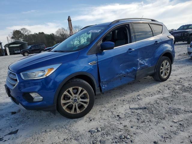 FORD ESCAPE SE 2018 with VIN 1FMCU9GD8JUA28794 - Photo from auction