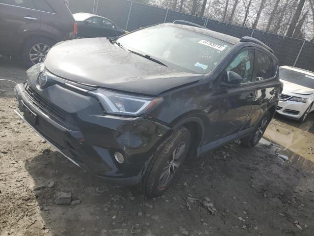 TOYOTA RAV4 XLE 2017 with VIN 2T3RFREV1HW579098 - Photo from auction