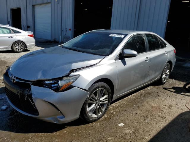 TOYOTA CAMRY LE 2017 with VIN 4T1BF1FKXHU690443 - Photo from auction