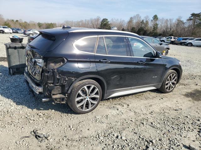 Photo 3 from auction – 2017 BMW X1 XDRIVE2 with VIN WBXHT3C34H5F70413