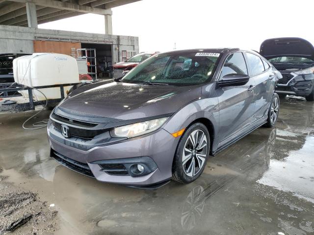 HONDA CIVIC EX 2017 with VIN 19XFC1F36HE004789 - Photo from auction