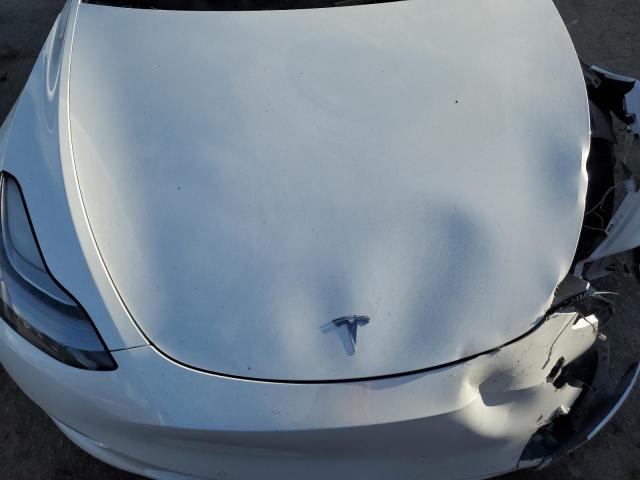 Photo 11 from auction – 2021 TESLA MODEL Y with VIN 5YJYGDEFXMF097928
