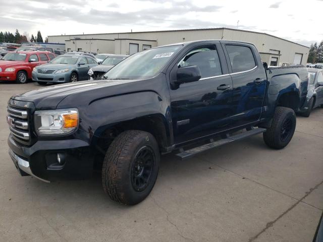 GMC CANYON SLE 2015 with VIN 1GTG6BE34F1174636 - Photo from auction