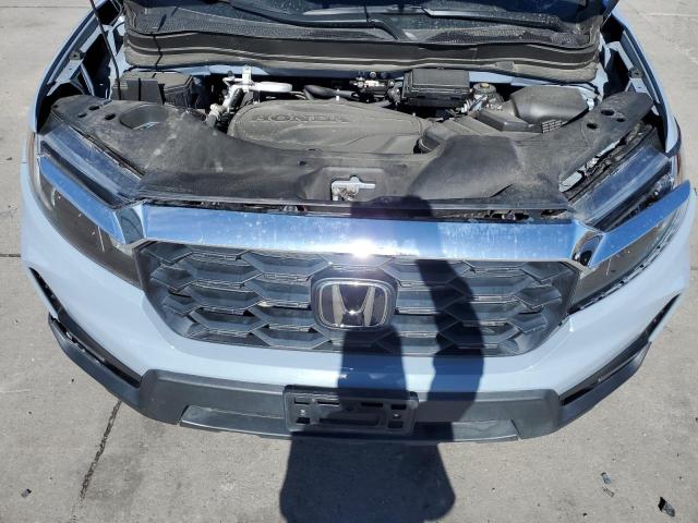 Photo 12 from auction – 2023 HONDA PASSPORT E with VIN 5FNYF8H57PB008950