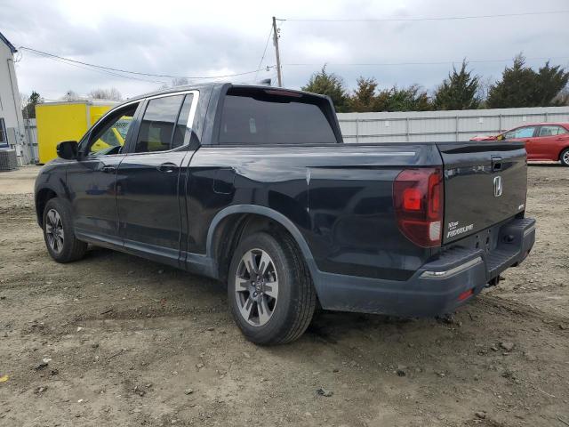 Photo 2 from auction – 2017 HONDA RIDGELINE with VIN 5FPYK3F67HB025167