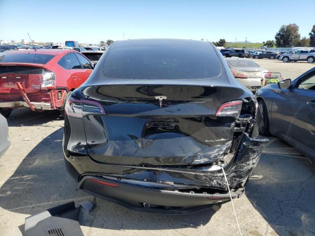 Photo 6 from auction – 2023 TESLA MODEL Y with VIN 7SAYGDEE0PF630531