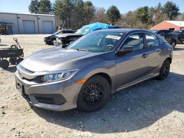 HONDA CIVIC LX 2018 with VIN 19XFC2E57JE011961 - Photo from auction