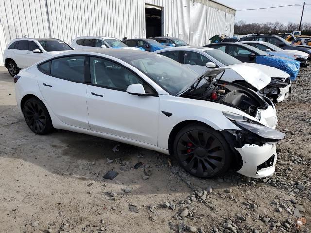 Photo 4 from auction – 2021 TESLA MODEL 3 with VIN 5YJ3E1EC2MF044192