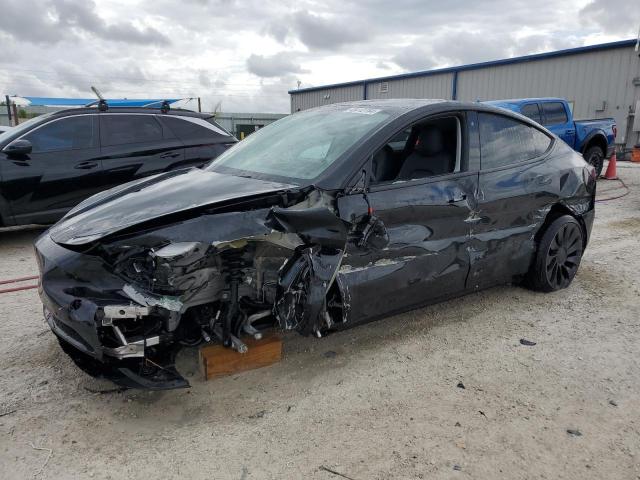 TESLA MODEL Y 2022 with VIN 7SAYGDEFXNF513612 - Photo from auction