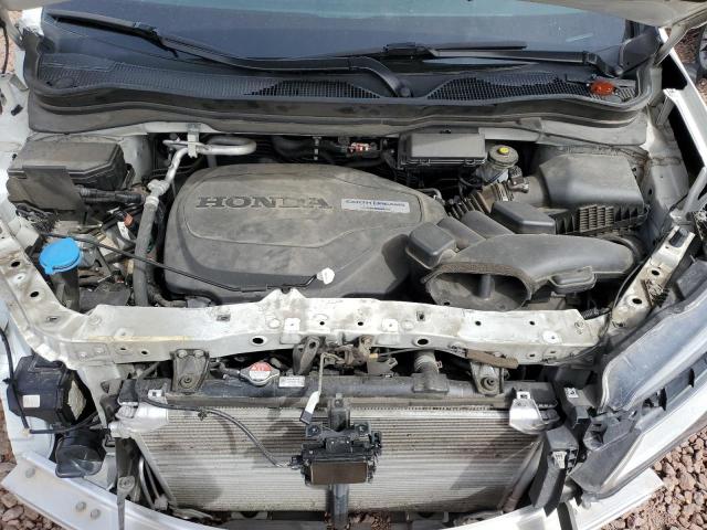 Photo 11 from auction – 2019 HONDA PILOT ELIT with VIN 5FNYF6H03KB061369
