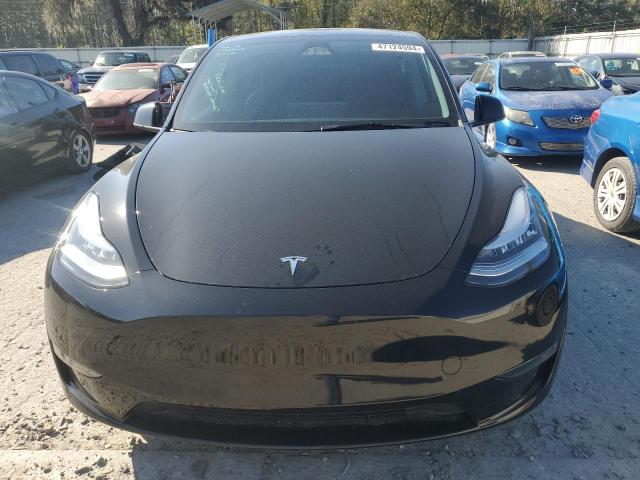 Photo 5 from auction – 2023 TESLA MODEL Y with VIN 7SAYGDEE2PA147930