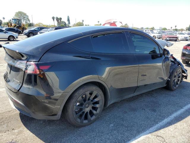 Photo 3 from auction – 2022 TESLA MODEL Y with VIN 7SAYGAEE1NF312932