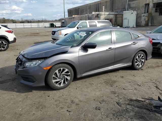 HONDA CIVIC EX 2018 with VIN 19XFC2F79JE013498 - Photo from auction