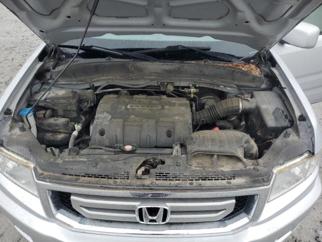 Photo 11 from auction – 2010 HONDA RIDGELINE with VIN 5FPYK1F55AB005940