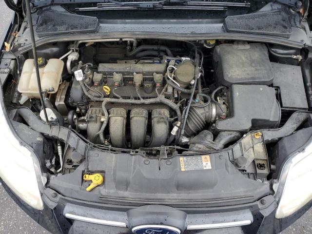 Photo 11 from auction – 2014 FORD FOCUS SE with VIN 1FADP3F28EL386931