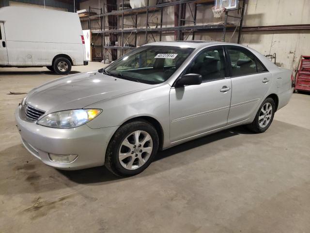 TOYOTA CAMRY LE 2005 with VIN 4T1BF30K85U596738 - Photo from auction