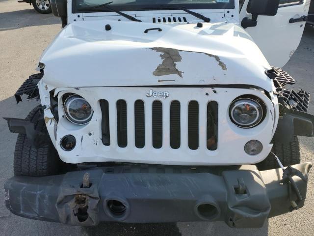Photo 12 from auction – 2015 JEEP WRANGLER U with VIN 1C4HJWDG7FL556873