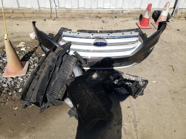 Photo 13 from auction – 2019 FORD ESCAPE TIT with VIN 1FMCU9J94KUA58154