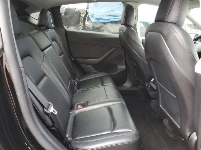 Photo 10 from auction – 2021 TESLA MODEL Y with VIN 5YJYGDEE8MF284348