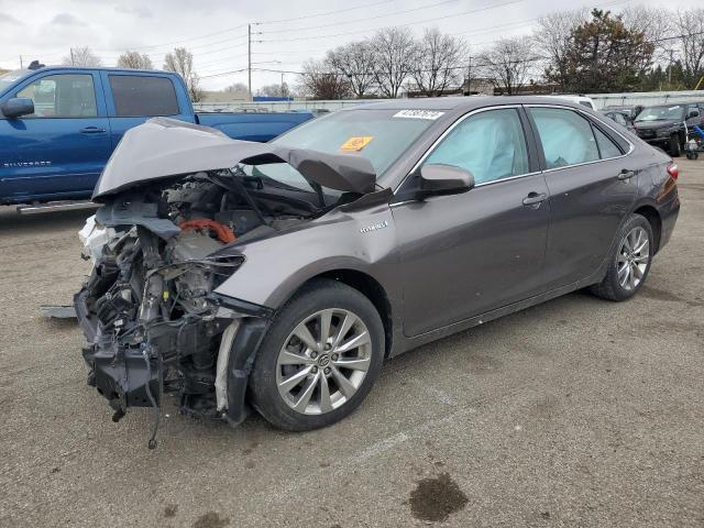 Photo 1 from auction – 2015 TOYOTA CAMRY HYBR with VIN 4T1BD1FK2FU171292