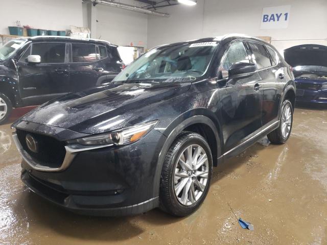 MAZDA CX-5 GRAND 2021 with VIN JM3KFBAY7M0301157 - Photo from auction