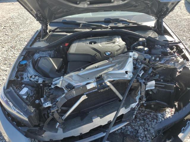 Photo 11 from auction – 2023 BMW 330I with VIN 3MW69FF09P8D02734