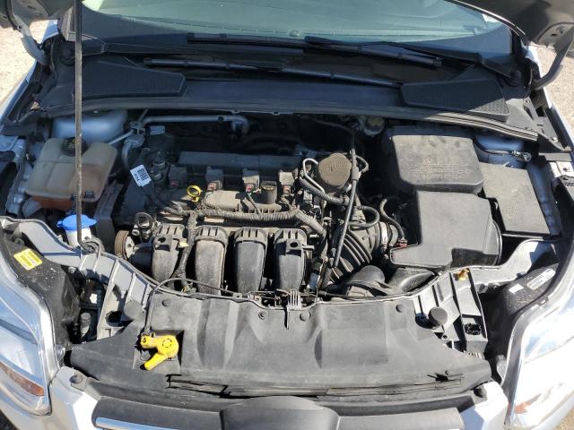 Photo 11 from auction – 2014 FORD FOCUS SE with VIN 1FADP3F26EL452330