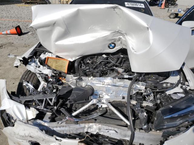 Photo 11 from auction – 2022 BMW 330I with VIN 3MW5R1J06N8C64169