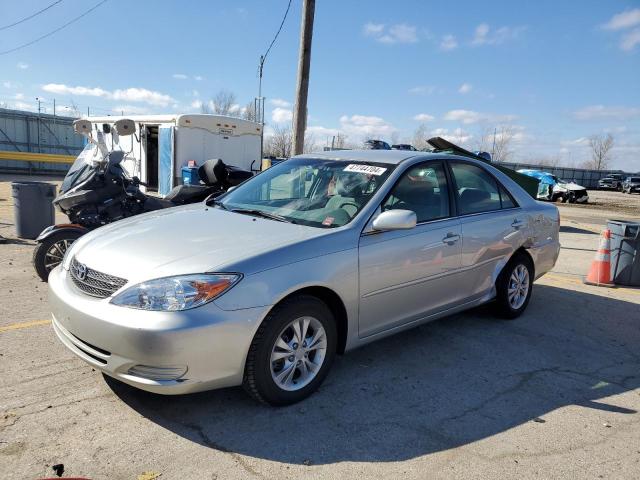 TOYOTA CAMRY LE 2004 with VIN 4T1BF32KX4U066637 - Photo from auction