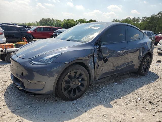 TESLA MODEL Y 2023 with VIN 7SAYGDEE9PA098774 - Photo from auction