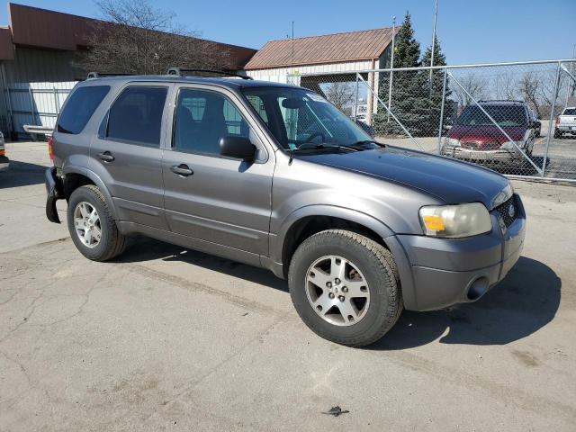 Photo 4 from auction – 2005 FORD ESCAPE LIM with VIN 1FMYU04195KC73682