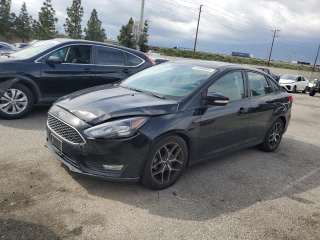 FORD FOCUS SEL 2018 with VIN 1FADP3H23JL231016 - Photo from auction