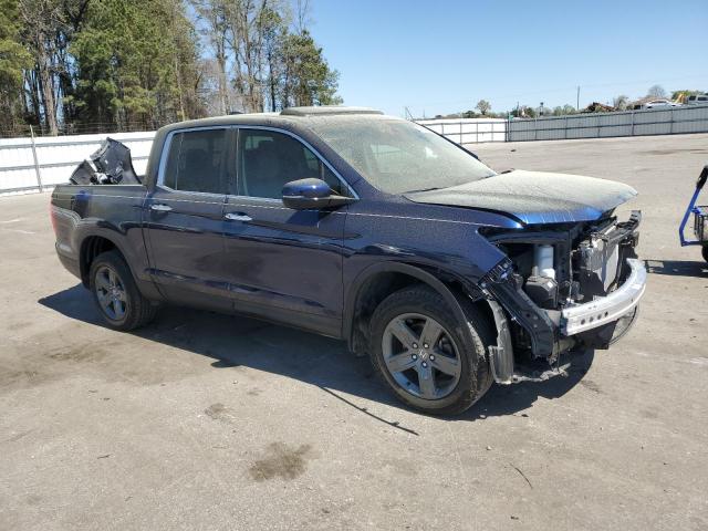 Photo 4 from auction – 2023 HONDA RIDGELINE with VIN 5FPYK3F77PB008408