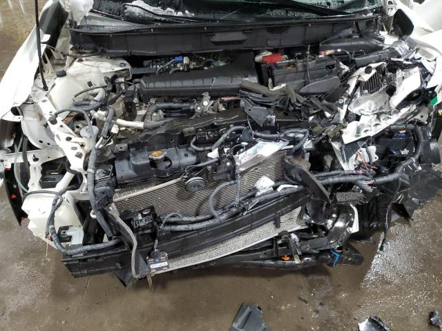 Photo 11 from auction – 2015 NISSAN ROGUE S with VIN 5N1AT2MV4FC810781