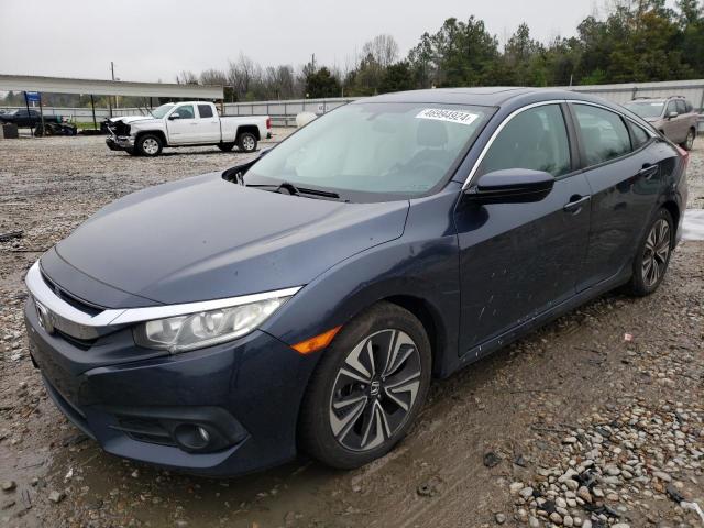 HONDA CIVIC EX 2016 with VIN 19XFC1F33GE034850 - Photo from auction