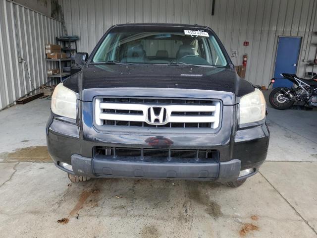 Photo 5 from auction – 2006 HONDA PILOT EX with VIN 2HKYF18766H552588