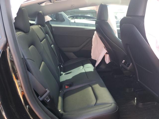 Photo 10 from auction – 2023 TESLA MODEL Y with VIN 7SAYGDEE5PF690269